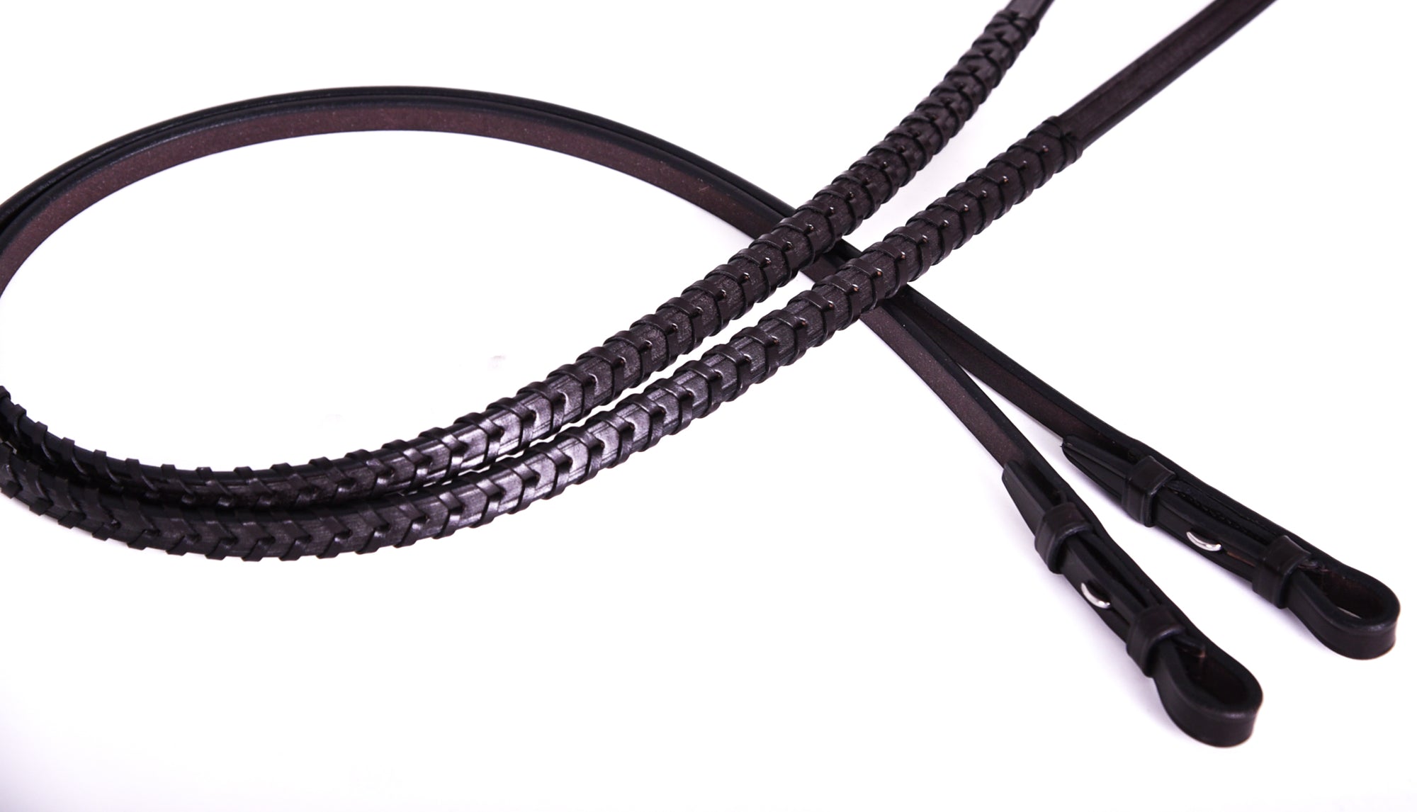 Close-up of Finely Laced Reins Detailing Lacing and Texture -