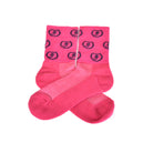 Bright pink socks with repeating circular Freedman's logo pattern in dark blue, laid flat with visible heel and toe details, white background.