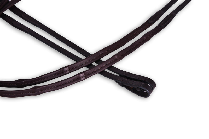 Close-up of brown leather Soft Padded Ratchet Reins by Freedman's with stitching detail, displayed on a white background.