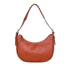 Cognac Brett Bag with braided shoulder strap, shown on a white background.