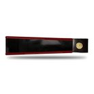 Dark Red and Black patent leather browband, wide tapered design, turned edge, polished brass Freedman logo buttons, laid flat.