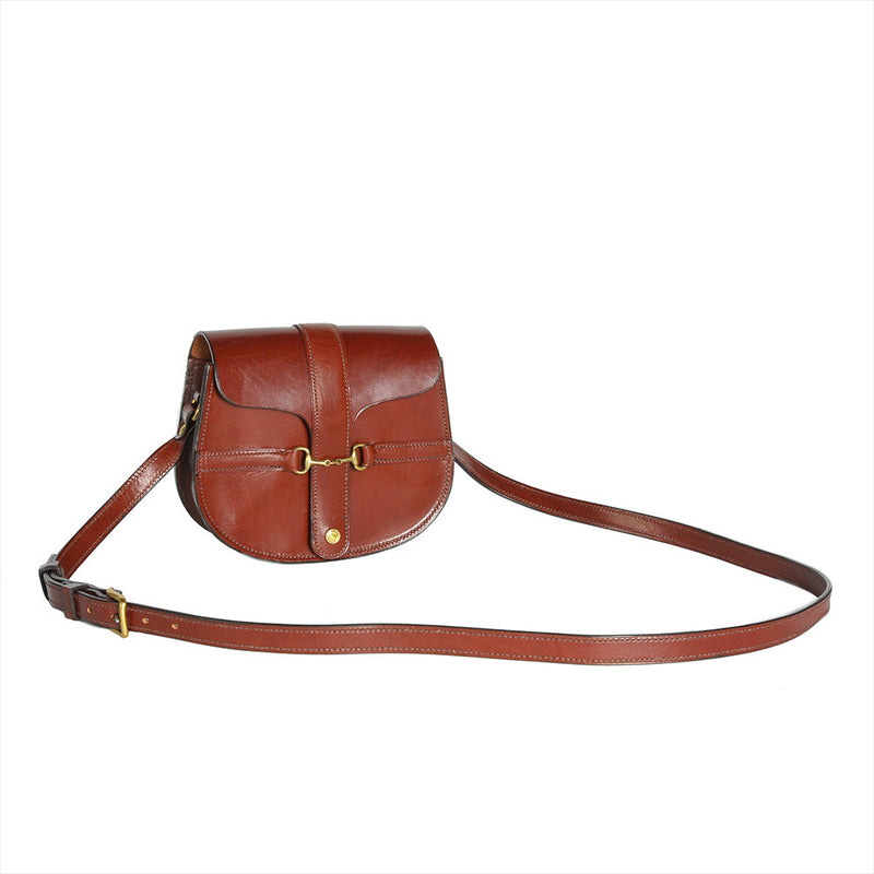 Cognac leather Small Snaffle Bit Shoulder Bag by Freedman's with Brass snaffle bit hardware and adjustable strap, displayed on a white background.